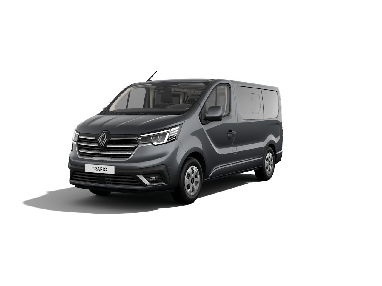 Grauer Renault Trafic Transporter, leicht seitlich, moderne Form, mit hellen Rädern und markanter Frontpartie.