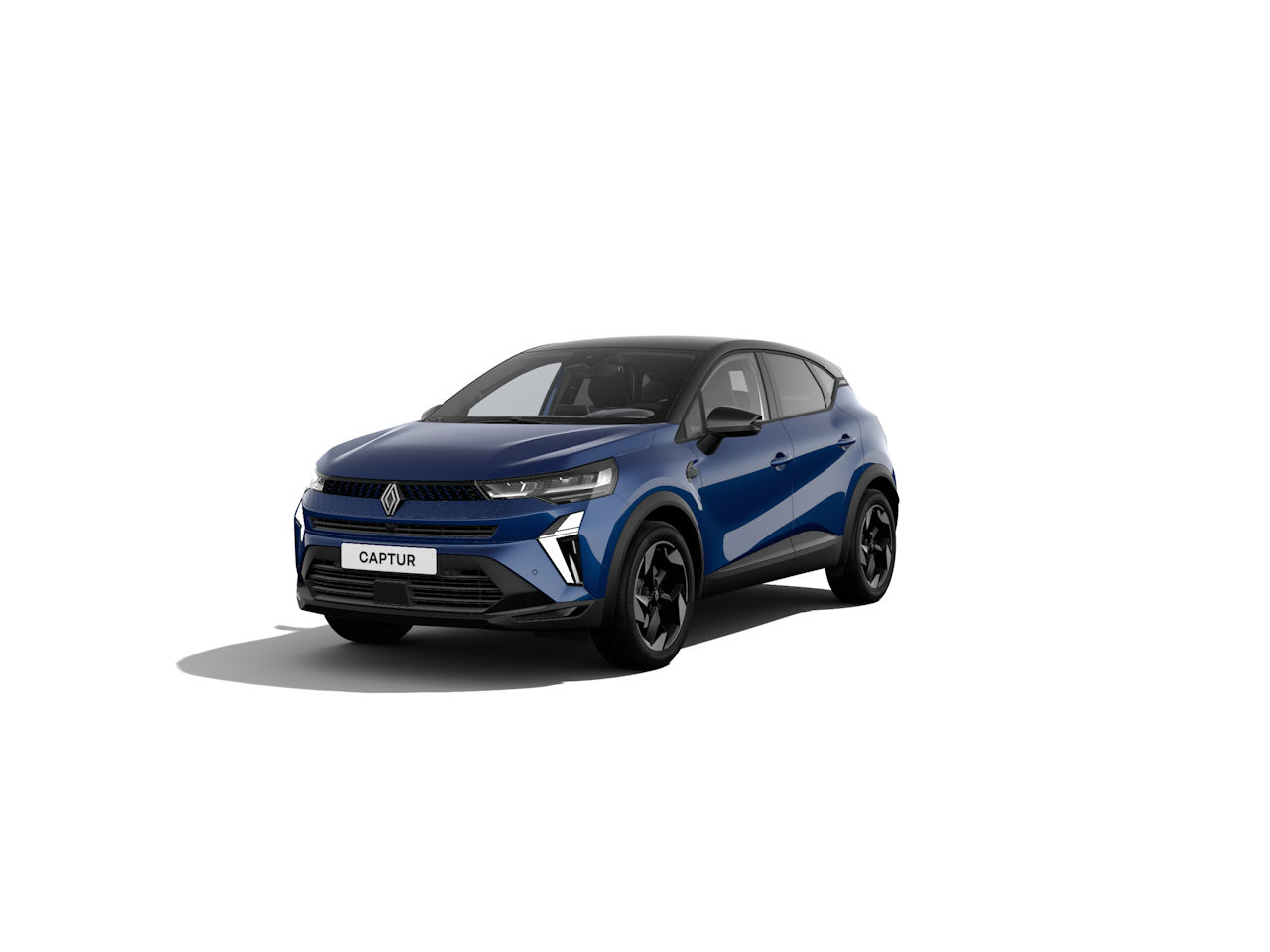 Renault Captur in Blau mit sportlichem Design und schwarzen Akzenten auf hellem Hintergrund.