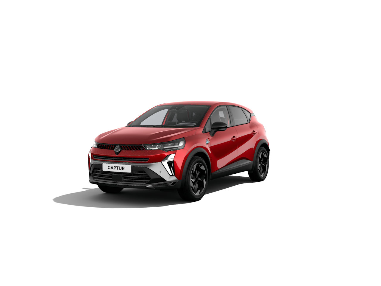 Renault Captur, rotes SUV-Modell mit modernen Designelementen, von vorne mit leuchtenden Scheinwerfern.