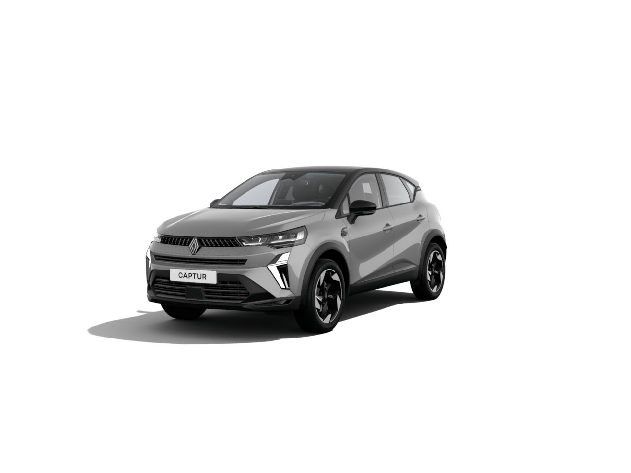 Ein grauer Renault Captur SUV mit sportlichem Design auf weißem Hintergrund.