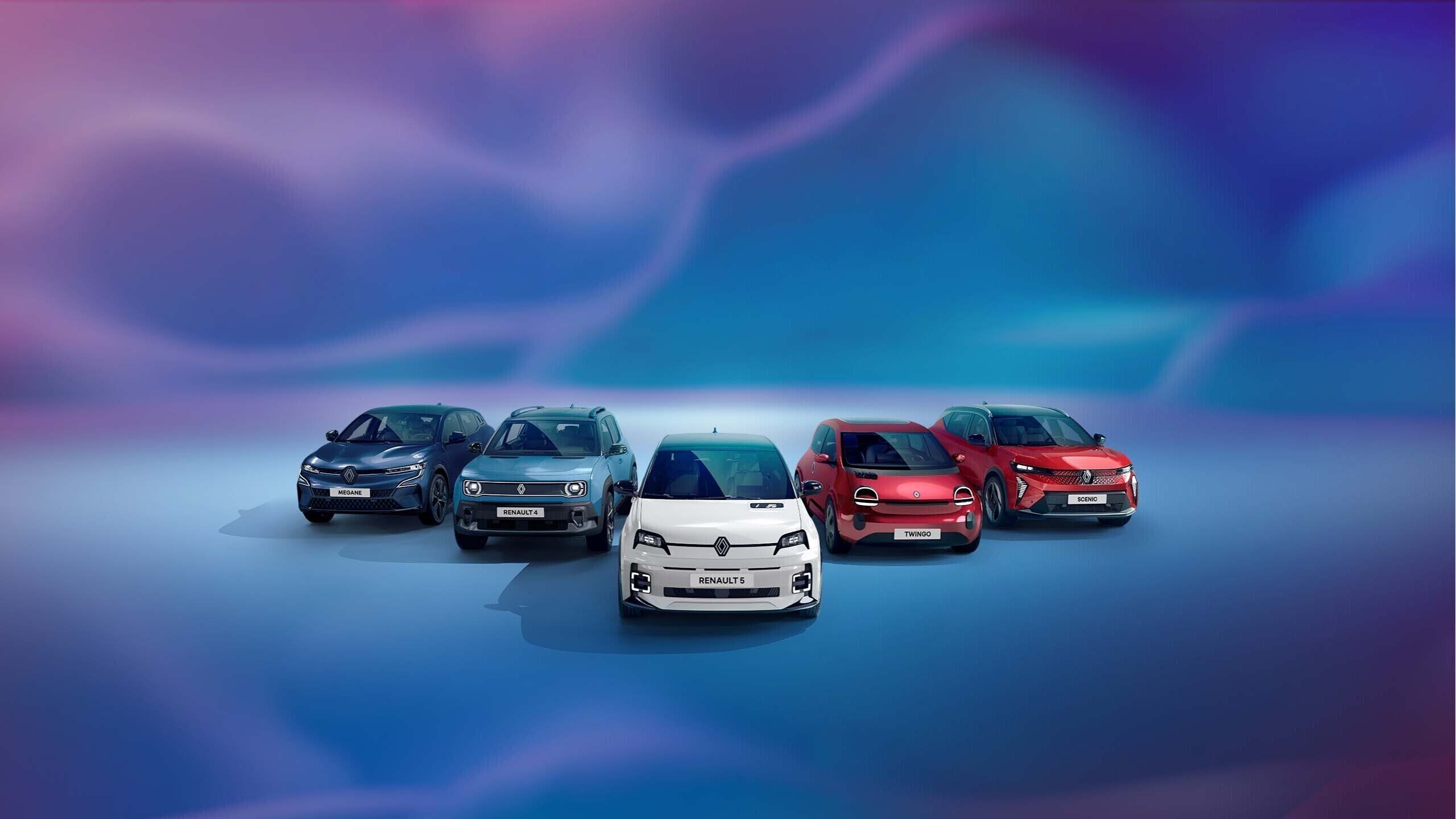 Eine Reihe von sechs Renault-Fahrzeugen vor einem bunten, verschwommenen Hintergrund.